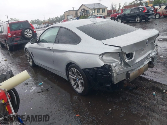 2015 BMW 4 Series 428i with VIN WBA3N3C55FK233180, listed as a IAAI auction lot 42222285 with 190,073 mi miles and . Bid and sale history available at DreamBid. Image 3.