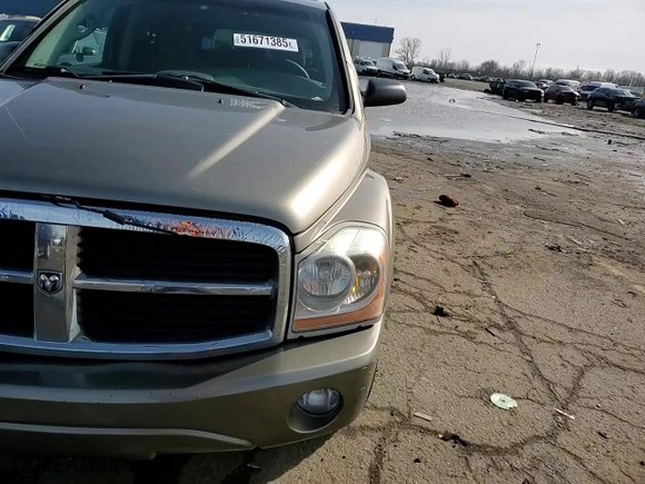 2006 Dodge Durango SLT with VIN 1D4HD48N06F187408, listed as a Copart auction lot 51671385 with 243,019 mi miles and Salvage Title. Bid and sale history available at carsss.com. Image 10.