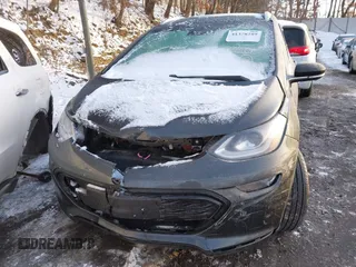 2021 Chevrolet Bolt EV Premier z VIN 1G1FZ6S09M4113694, wystawiony jako IAAI lot #41378289 z przebiegiem 40 979 mil mil oraz . Historia ofert i sprzedaży dostępna na DreamBid. Obrazek 6.