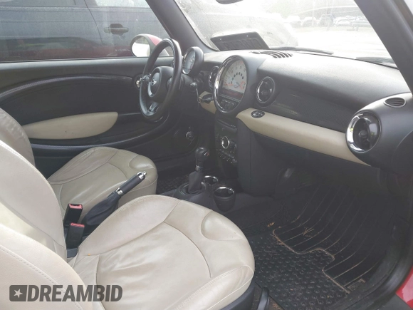 2012 MINI Convertible S with VIN WMWZP3C5XCT249627, listed as a IAAI auction lot 41430331 with 157,533 mi miles and . Bid and sale history available at DreamBid. Image 5.
