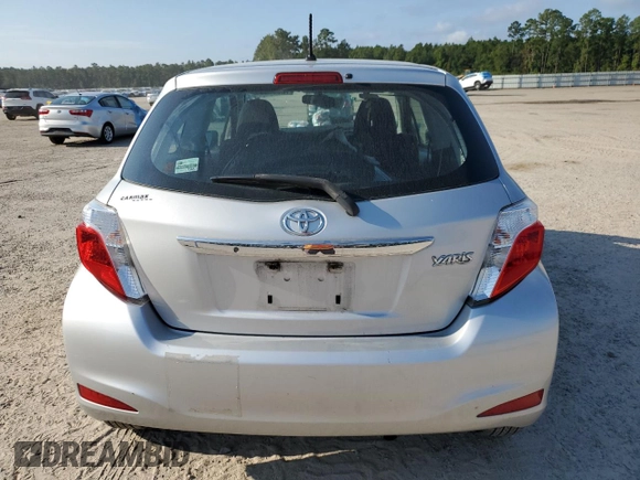 2014 Toyota Yaris L with VIN VNKJTUD30EA006137, listed as a Copart auction lot 72061304 with 104,664 mi miles and Salvage Title. Bid and sale history available at carsss.com. Image 6.