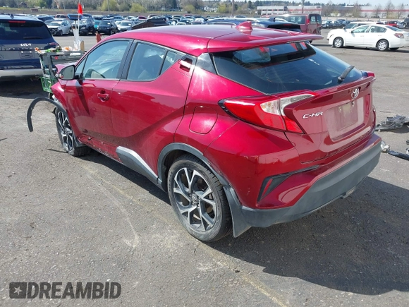 2018 Toyota C-HR XLE z VIN NMTKHMBX9JR023325, wystawiony jako IAAI lot #41926223 z przebiegiem 62 580 mil mil oraz . Historia ofert i sprzedaży dostępna na DreamBid. Obrazek 3.
