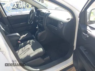 2012 Jeep Compass Latitude with VIN 1C4NJCEA7CD639298, listed as a IAAI auction lot 42121430 with 166,409 mi miles. Bid and sale history available at carsss.com. Image 5.