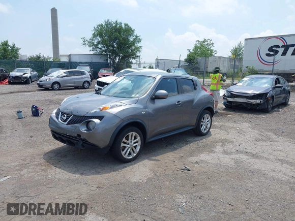 2014 Nissan Juke SL with VIN JN8AF5MV3ET359021, listed as a IAAI auction lot 42602201 with 99,332 mi miles and . Bid and sale history available at DreamBid. Image 2.