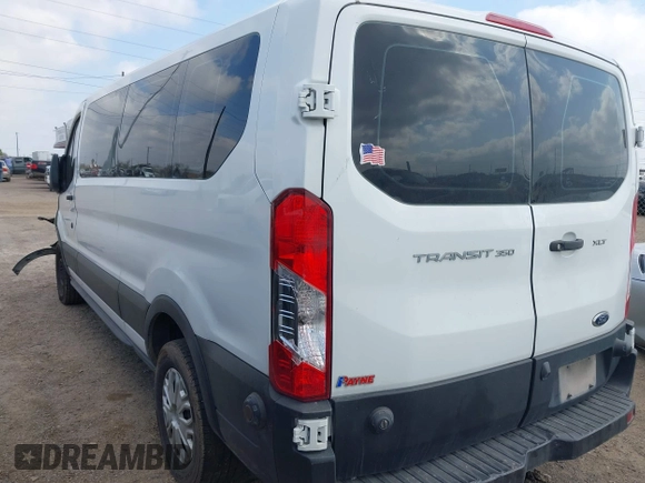 2019 Ford Transit Passenger XL with VIN 1FBZX2YM5KKA48112, listed as a IAAI auction lot 41518013 with 163,856 mi miles and . Bid and sale history available at DreamBid. Image 3.
