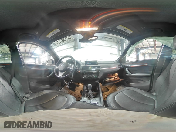 2017 BMW X1 xDrive28i with VIN WBXHT3Z38H4A53824, listed as a Copart auction lot 52500215 with 106,782 mi miles and Salvage title. Bid and sale history available at DreamBid. Image 16.