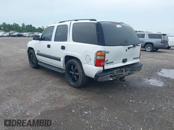 2003 Chevrolet Tahoe LS z VIN 1GNEC13Z53R173663, wystawiony jako IAAI lot #42695621 z przebiegiem 431 013 mil mil oraz . Historia ofert i sprzedaży dostępna na DreamBid. Obrazek 3.