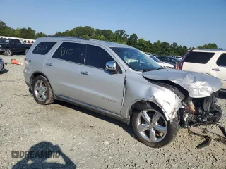 2012 Dodge Durango Citadel with VIN 1C4RDHEG9CC306245, listed as a Copart auction lot 68338204 with 183,382 mi miles and Salvage title. Bid and sale history available at DreamBid. Image 4.