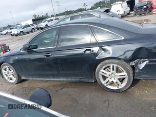 2016 Audi A6 Premium Plus z VIN WAUGFAFCXGN121312, wystawiony jako IAAI lot #41923717 z przebiegiem 215 000 mil mil oraz . Historia ofert i sprzedaży dostępna na DreamBid. Obrazek 14.