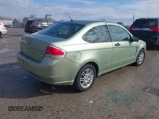 2008 Ford Focus SE with VIN 1FAHP33N08W140376, listed as a IAAI auction lot 41661418 with 174,630 mi miles. Bid and sale history available at carsss.com. Image 4.