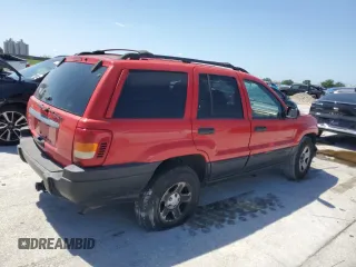 1999 Jeep Grand Cherokee Laredo z VIN 1J4G258SXXC518308, wystawiony jako Copart lot #56636235 z przebiegiem 233 649 mil mil oraz Szkoda całkowita • Salvage title. Historia ofert i sprzedaży dostępna na DreamBid. Obrazek 3.