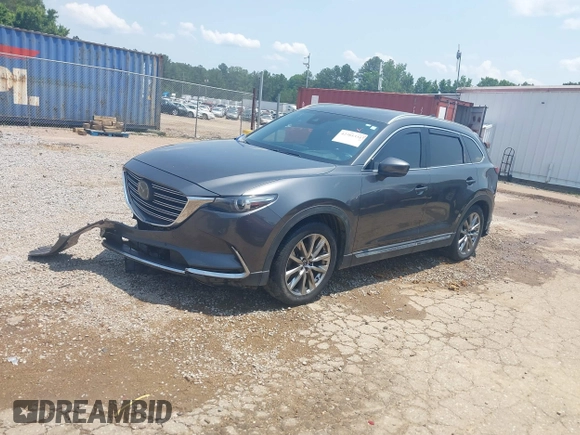 2018 Mazda CX-9 Grand Touring with VIN JM3TCADY7J0217595, listed as a IAAI auction lot 42381331 with 130,604 mi miles and . Bid and sale history available at DreamBid. Image 20.