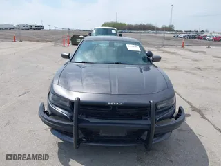 2020 Dodge Charger Police with VIN 2C3CDXKT3LH112023, listed as a IAAI auction lot 42124903 with 130,738 mi miles. Bid and sale history available at carsss.com. Image 6.