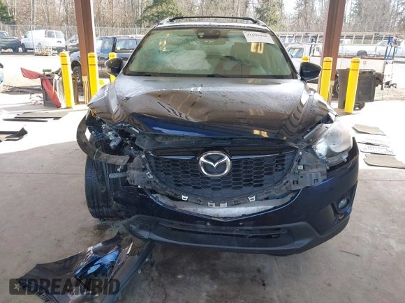 2014 Mazda CX-5 Grand Touring with VIN JM3KE2DY6E0394172, listed as a IAAI auction lot 41698468 with 89,554 mi miles. Bid and sale history available at carsss.com. Image 12.