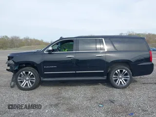 2019 Chevrolet Suburban LT with VIN 1GNSCHKC2KR408575, listed as a IAAI auction lot 42060103 with 144,838 mi miles and . Bid and sale history available at DreamBid. Image 14.