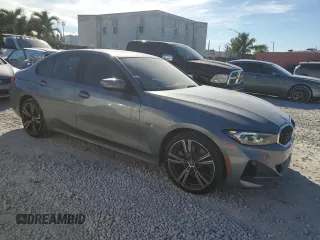 2023 BMW 3 Series 330e with VIN 3MW39FF03P8D03381, listed as a Copart auction lot 87578195 with 19,441 mi miles and Non Repairable. Bid and sale history available at carsss.com. Image 4.