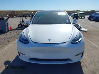 2022 Tesla Model Y Long Range with VIN 7SAYGDEE1NF364241, listed as a IAAI auction lot 42190272 with 54,878 mi miles and . Bid and sale history available at DreamBid. Image 12.