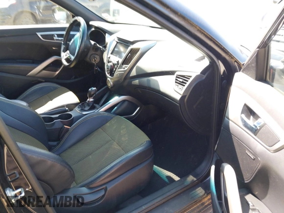 2016 Hyundai Veloster z VIN KMHTC6AD0GU249986, wystawiony jako IAAI lot #42361364 z przebiegiem 131 111 mil mil oraz . Historia ofert i sprzedaży dostępna na DreamBid. Obrazek 5.