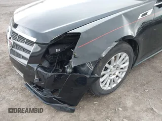 2011 Cadillac CTS z VIN 1G6DC5EY1B0156347, wystawiony jako IAAI lot #41496903 z przebiegiem 128 304 mil mil oraz . Historia ofert i sprzedaży dostępna na DreamBid. Obrazek 6.