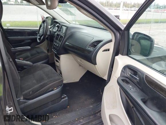2019 Dodge Grand Caravan SE with VIN 2C4RDGBGXKR796974, listed as a IAAI auction lot 42008704 with 129,229 mi miles and . Bid and sale history available at DreamBid. Image 5.