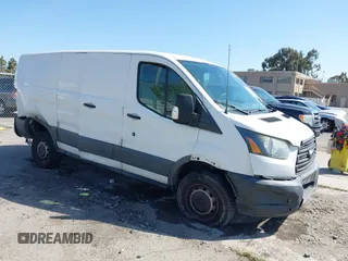 2015 Ford Transit Cargo with VIN 1FTYR1ZMXFKA44427, listed as a IAAI auction lot 42411415 with 276,085 mi miles and . Bid and sale history available at DreamBid. Image 1.