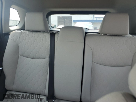 2024 Toyota Corolla Cross L with VIN 7MUAAAAG4RV097805, listed as a Copart auction lot 59846765 with 11,427 mi miles and Salvage title. Bid and sale history available at DreamBid. Image 10.