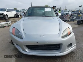 2002 Honda S2000 z VIN JHMAP11492T004927, wystawiony jako IAAI lot #42062377 z przebiegiem 117 612 mil mil oraz . Historia ofert i sprzedaży dostępna na DreamBid. Obrazek 13.
