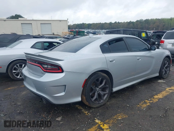 2019 Dodge Charger R/T with VIN 2C3CDXCTXKH757197, listed as a IAAI auction lot 41860544 with 98,820 mi miles and . Bid and sale history available at DreamBid. Image 4.