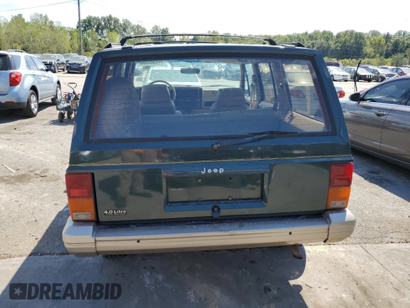 1993 Jeep Cherokee Country with VIN 1J4FJ78S4PL517648, listed as a Copart auction lot 72383564 with 127,156 mi miles and Salvage Title. Bid and sale history available at carsss.com. Image 6.