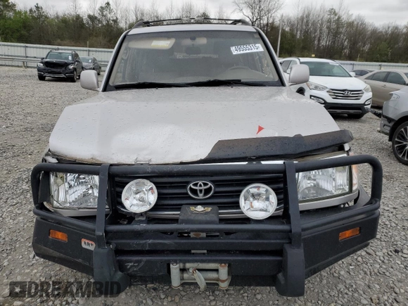 1999 Toyota Land Cruiser z VIN JT3HT05J6X0064313, wystawiony jako Copart lot #49555315 z przebiegiem 177 814 mil mil oraz Szkoda całkowita • Salvage title. Historia ofert i sprzedaży dostępna na DreamBid. Obrazek 5.