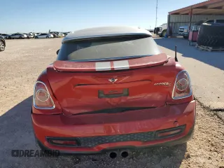 2012 MINI Coupe S z VIN WMWSX3C56CT408371, wystawiony jako Copart lot #73730514 z przebiegiem 95 786 mil mil oraz Szkody całkowita. Historia ofert i sprzedaży dostępna na DreamBid. Obrazek 6.