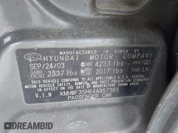 2004 Hyundai Sonata GLS with VIN KMHWF35H64A957365, listed as a IAAI auction lot 42150369 with 247,348 mi miles. Bid and sale history available at carsss.com. Image 9.
