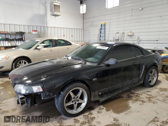 2001 Ford Mustang GT Deluxe with VIN 1FAFP42X51F230659, listed as a Copart auction lot 44784605 with 185,358 mi miles and Salvage Title. Bid and sale history available at carsss.com. Image 1.