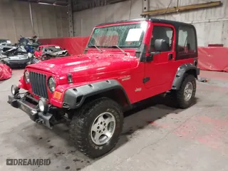 2004 Jeep Wrangler Sport with VIN 1J4FA49S04P722840, listed as a IAAI auction lot 41702079 with 203,243 mi miles. Bid and sale history available at carsss.com. Image 18.