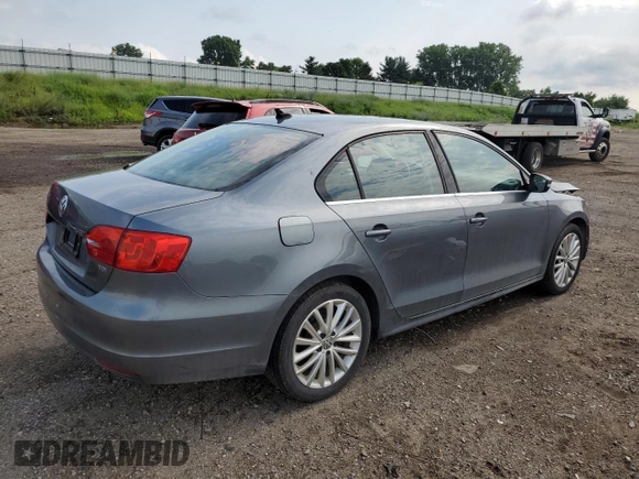 2014 Volkswagen Jetta TDI w/Premium with VIN 3VWLL7AJ6EM428743, listed as a Copart auction lot 63459355 with 145,814 mi miles and Salvage title. Bid and sale history available at DreamBid. Image 3.