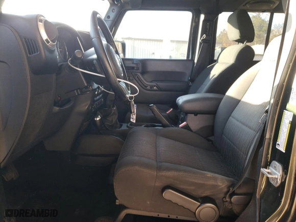 2011 Jeep Wrangler Unlimited Sahara with VIN 1J4BA5H15BL635016, listed as a Copart auction lot 84433444 with 124,217 mi miles and Salvage Title. Bid and sale history available at carsss.com. Image 7.