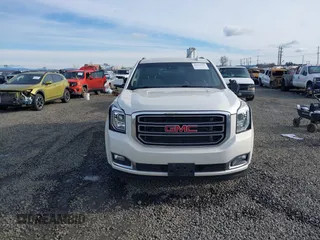 2015 GMC Yukon XL SLT with VIN 1GKS2HKC3FR586338, listed as a IAAI auction lot 41632662 with 149,133 mi miles. Bid and sale history available at carsss.com. Image 12.