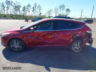 2015 Ford Focus Titanium with VIN 1FADP3N28FL215499, listed as a IAAI auction lot 41839092 with 152,102 mi miles. Bid and sale history available at carsss.com. Image 13.