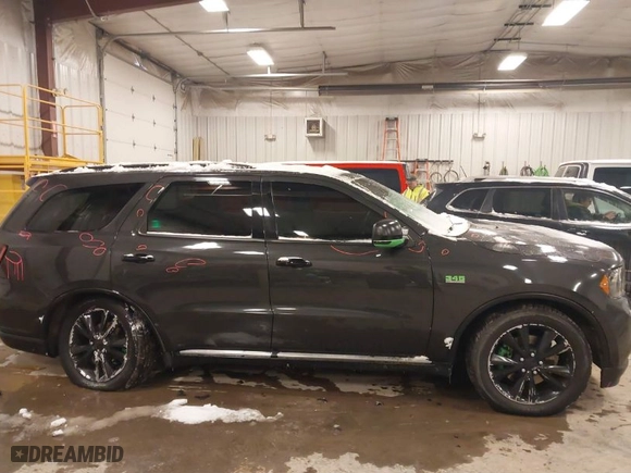 2011 Dodge Durango Crew with VIN 1D4SE4GT9BC638964, listed as a IAAI auction lot 41546778 with 90,959 mi miles. Bid and sale history available at carsss.com. Image 13.