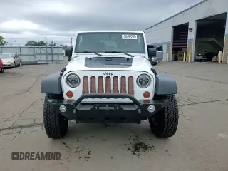 2013 Jeep Wrangler Rubicon 10th Anniversary z VIN 1C4BJWCGXDL543958, wystawiony jako Copart lot #58492255 z przebiegiem 94 455 mil mil oraz Szkoda całkowita • Salvage title. Historia ofert i sprzedaży dostępna na DreamBid. Obrazek 14.