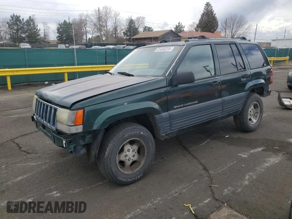 1996 Jeep Grand Cherokee Laredo with VIN 1J4GZ58S6TC165636, listed as a Copart auction lot 51485235 with 266,873 mi miles and Salvage Title. Bid and sale history available at carsss.com. Image 1.