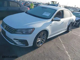 2018 Volkswagen Passat 2.0T S with VIN 1VWAA7A35JC009020, listed as a IAAI auction lot 41955626 with 99,900 mi miles. Bid and sale history available at carsss.com. Image 2.