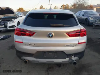 2019 BMW X2 sDrive28i with VIN WBXYJ3C54KEP77217, listed as a IAAI auction lot 41079851 with 100,149 mi miles. Bid and sale history available at carsss.com. Image 16.