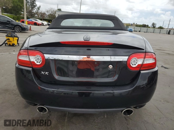 2011 Jaguar XK with VIN SAJWA4GB0BLB38875, listed as a Copart auction lot 52045805 with 35,487 mi miles and Salvage Title. Bid and sale history available at carsss.com. Image 6.