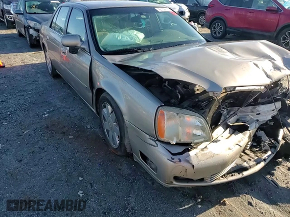 2003 Cadillac DeVille DTS z VIN 1G6KF57963U125853, wystawiony jako Copart lot #42559975 z przebiegiem Nie podano mil oraz Szkody całkowita. Historia ofert i sprzedaży dostępna na DreamBid. Obrazek 11.