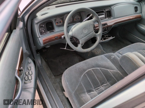 1996 Mercury Grand Marquis GS with VIN 2MELM74W5TX653873, listed as a Copart auction lot 74659254 with 86,589 mi miles and Salvage Title. Bid and sale history available at DreamBid. Image 8.