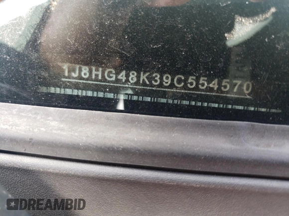 2009 Jeep Commander Sport z VIN 1J8HG48K39C554570, wystawiony jako Copart lot #52667825 z przebiegiem 194 886 mil mil oraz Szkoda całkowita • Salvage title. Historia ofert i sprzedaży dostępna na DreamBid. Obrazek 13.