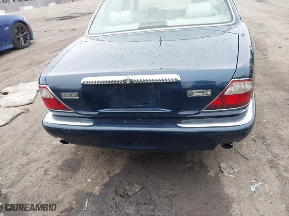 1998 Jaguar XJ Series Sedan Vanden Plas with VIN SAJKX6246WC832202, listed as a IAAI auction lot 41218807 with NaN miles. Bid and sale history available at carsss.com. Image 16.