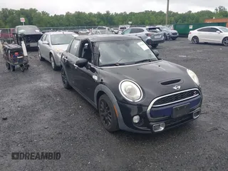 2015 MINI Hardtop 4 Door S with VIN WMWXU3C55F2B56429, listed as a IAAI auction lot 42335996 with 114,781 mi miles and . Bid and sale history available at DreamBid. Image 1.