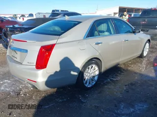 2014 Cadillac CTS Sedan RWD with VIN 1G6AP5SX8E0184038, listed as a IAAI auction lot 41235258 with 107,420 mi miles. Bid and sale history available at carsss.com. Image 4.